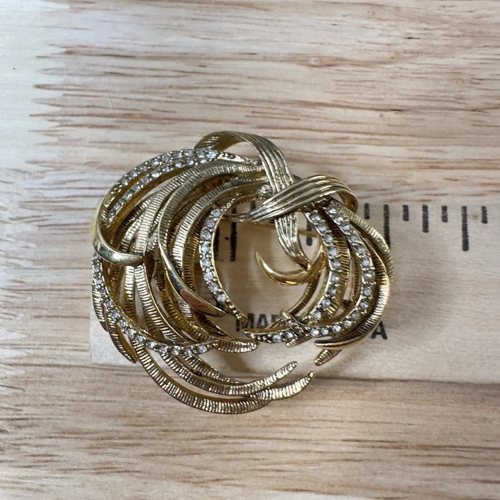 Vintage Monet Gold Tone Etched Swirl Rhinestone Brooch Signed BEAUTY